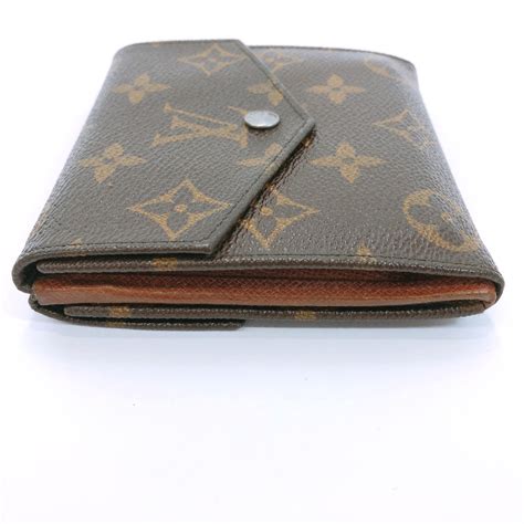 louis vuitton button wallet.